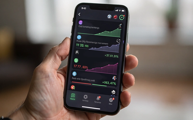 Smartphone affichant des notifications d'alertes de cotes